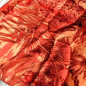 Gorgeous and elegant peach colored Salvatore Ferragamo scarf